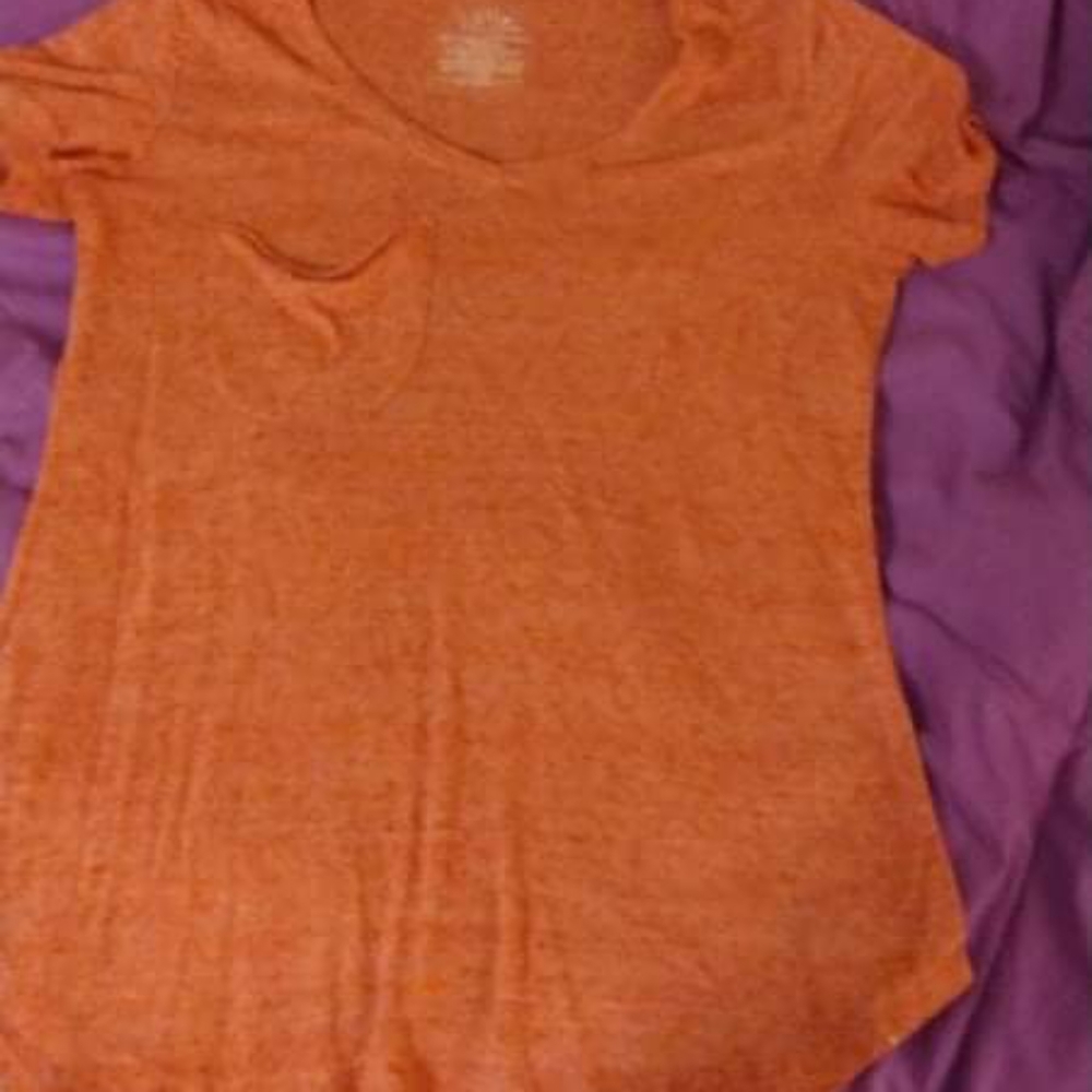 Light pink thin tee shirt size medium or 8-10